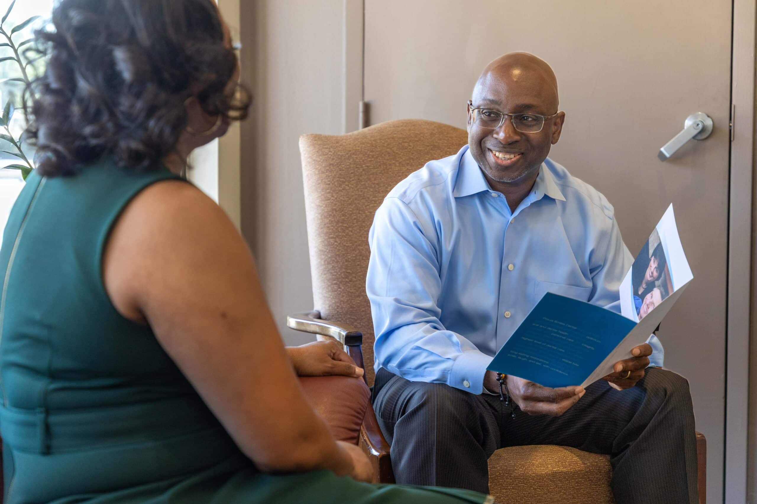 Patient discusses TMJ treatment options with a provider at Proud Smiles during a relaxed consultation session
